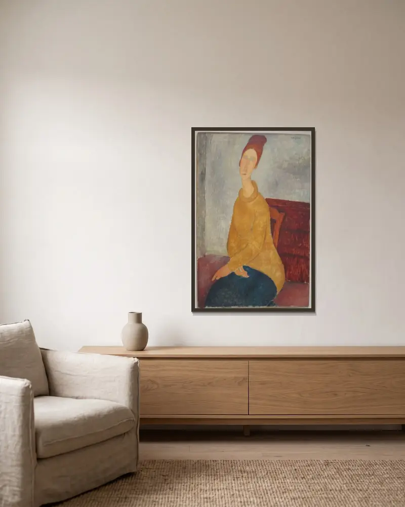 Jeanne Hébuterne in yellow sweater av Amedeo Modigliani inramad på en vägg