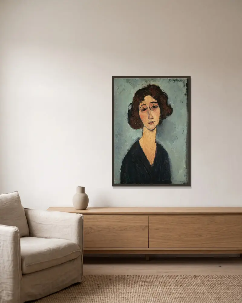 Jeune Femme av Amedeo Modigliani inramad på en vägg