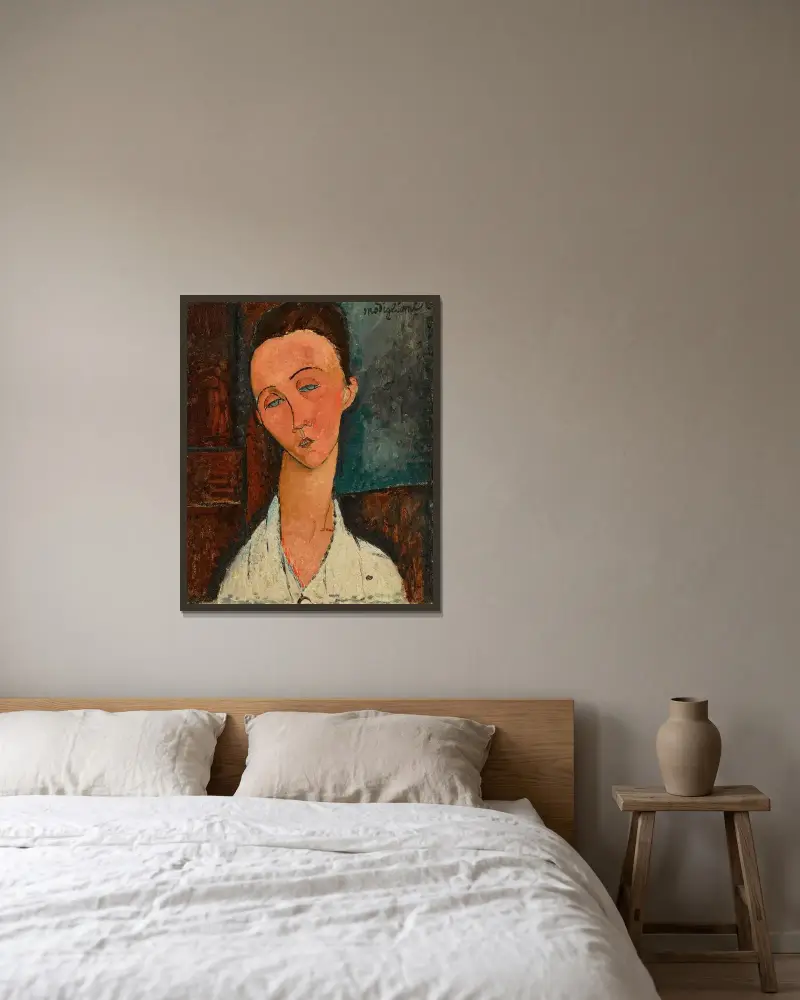 Portrait de Lunia Czechowska av Amedeo Modigliani inramad på en vägg