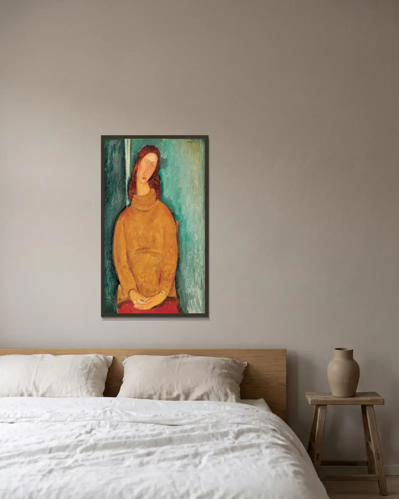 Portrait Of Jeanne Hébuterne – nr 1 av Amedeo Modigliani inramad på en vägg