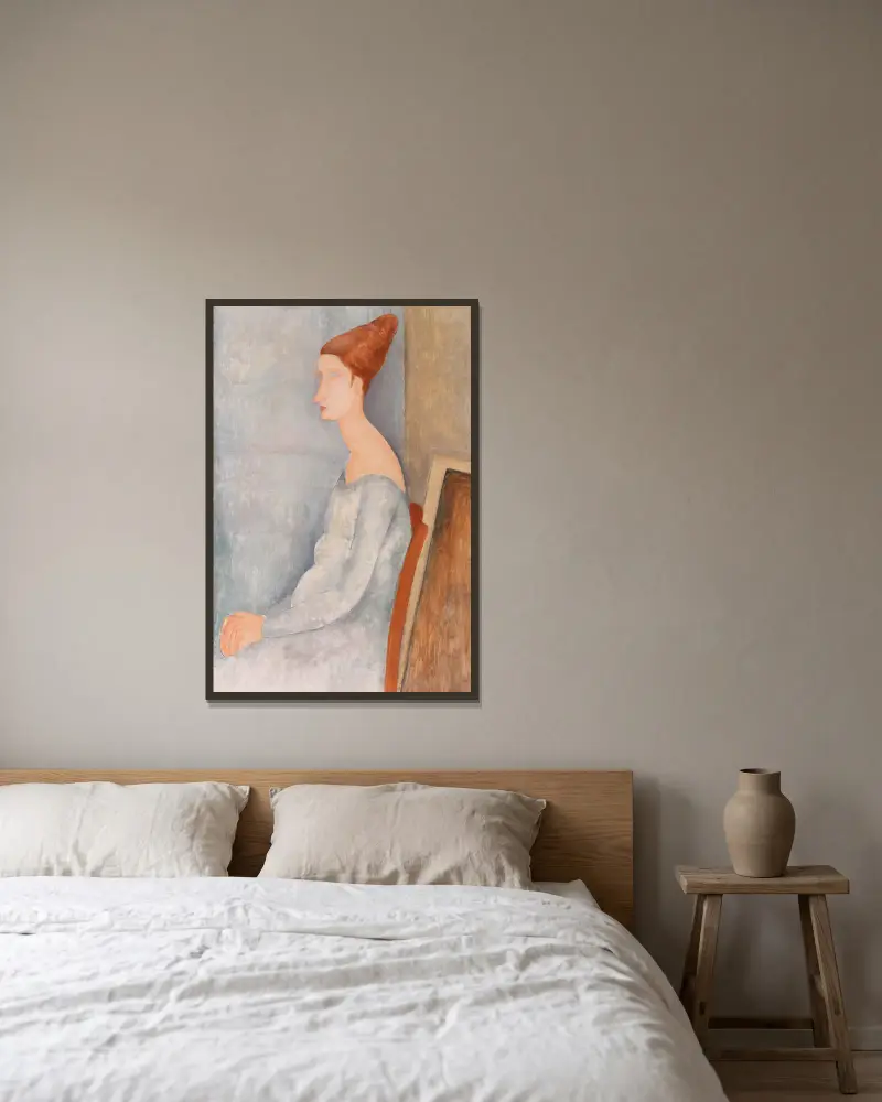 Portrait of Jeanne Hébuterne, 1918 av Amedeo Modigliani inramad på en vägg