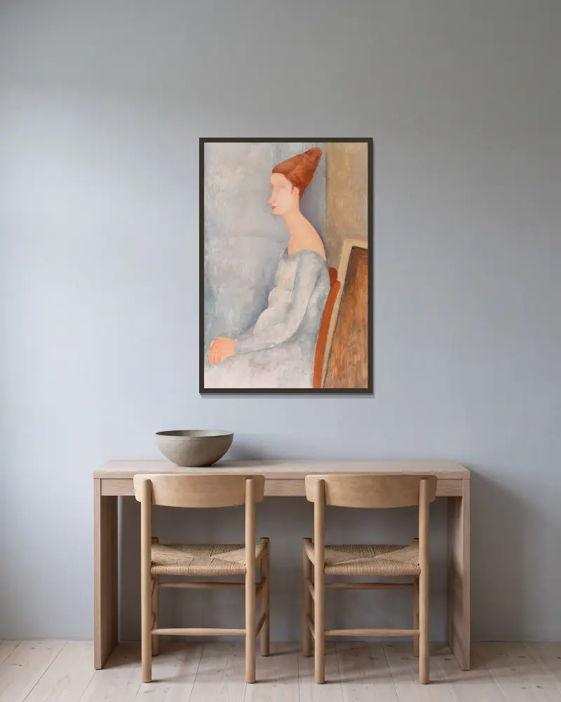 Portrait of Jeanne Hébuterne, 1918 av Amedeo Modigliani inramad på en vägg