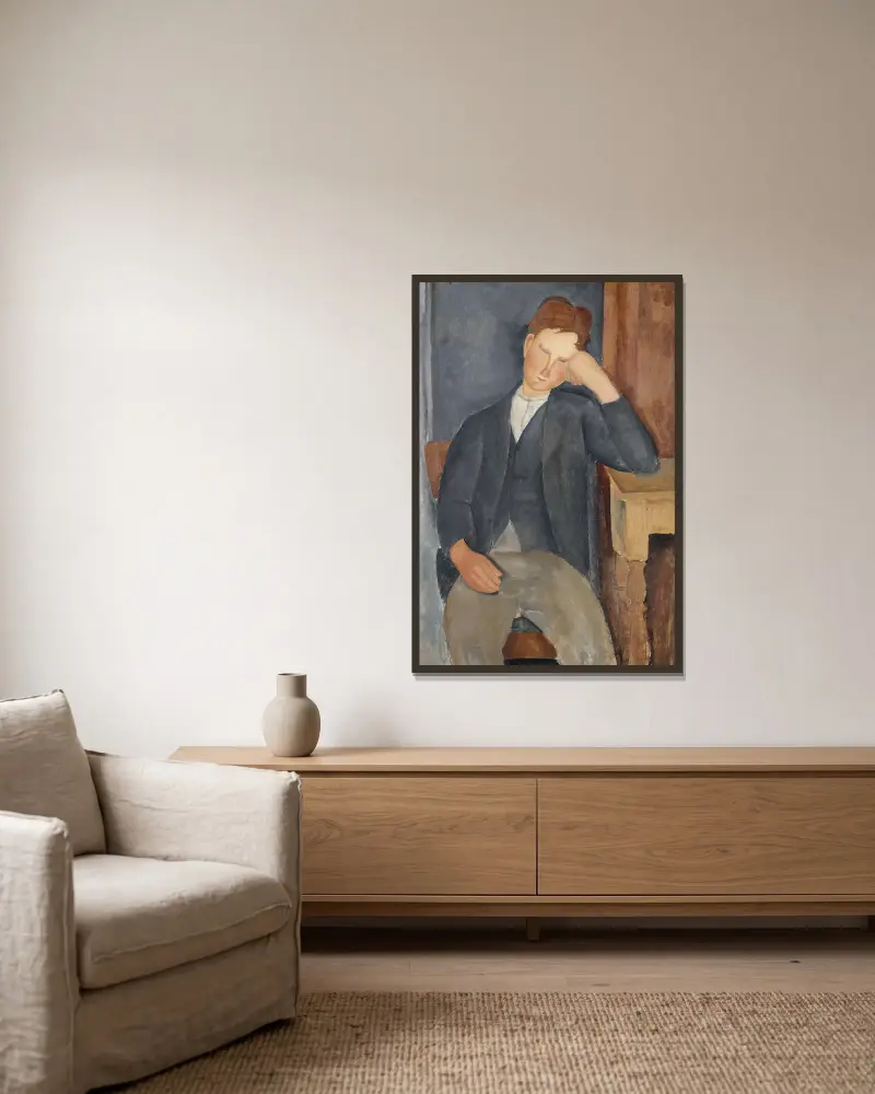 Der junge Lehrling von Amedeo Modigliani gerahmt an einer Wand
