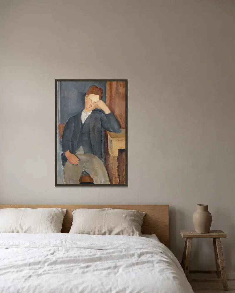 Der junge Lehrling von Amedeo Modigliani gerahmt an einer Wand