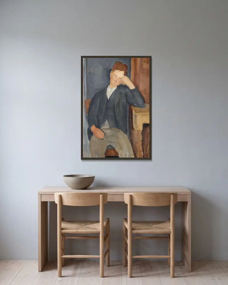 Der junge Lehrling von Amedeo Modigliani gerahmt an einer Wand