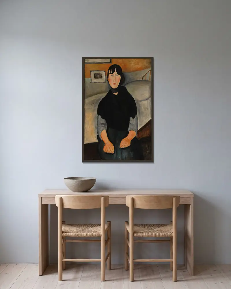 Young Woman of the People av Amedeo Modigliani inramad på en vägg