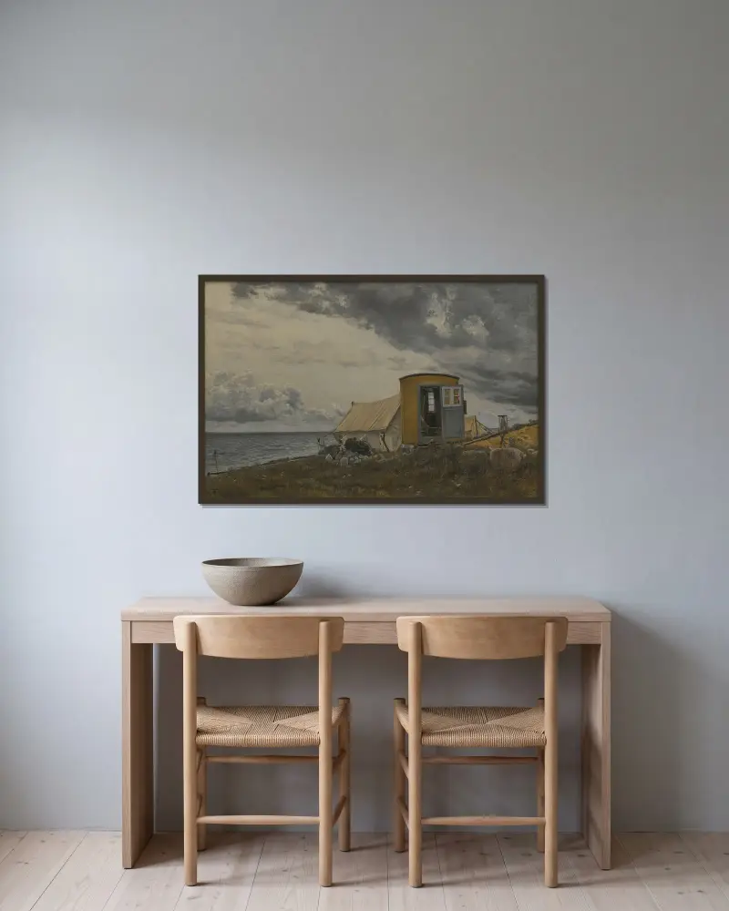 Vy över en strand med konstnärens vagn och tält på Enö av Laurits Andersen Ring inramad på en vägg