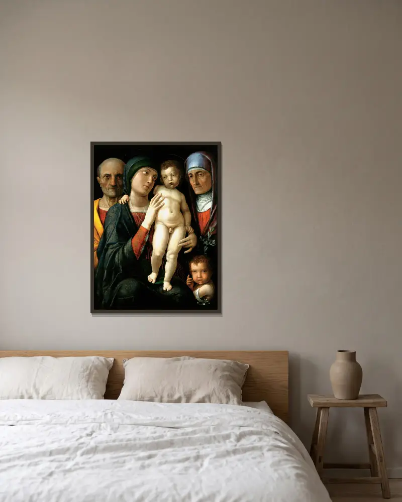 The Holy Family av Andrea Mantegna inramad på en vägg