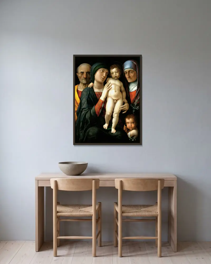 The Holy Family av Andrea Mantegna inramad på en vägg
