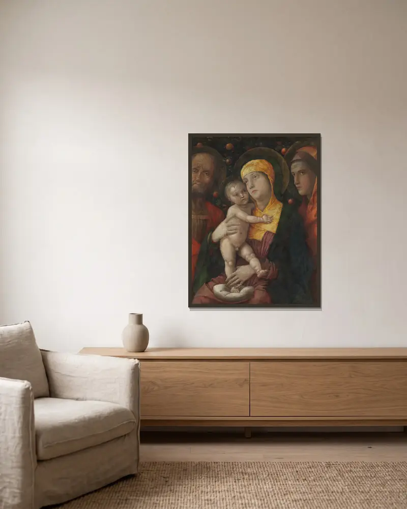 The Holy Family with Saint Mary Magdalen av Andrea Mantegna inramad på en vägg