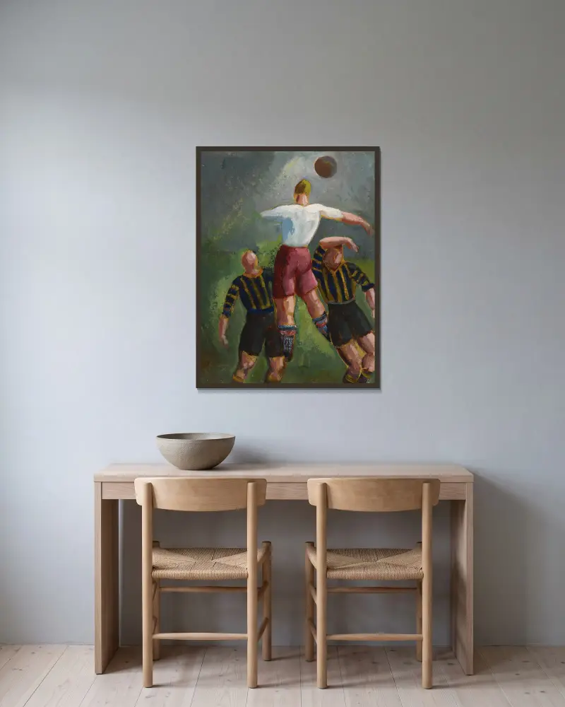 Kopfball von Ángel Zárraga gerahmt an einer Wand