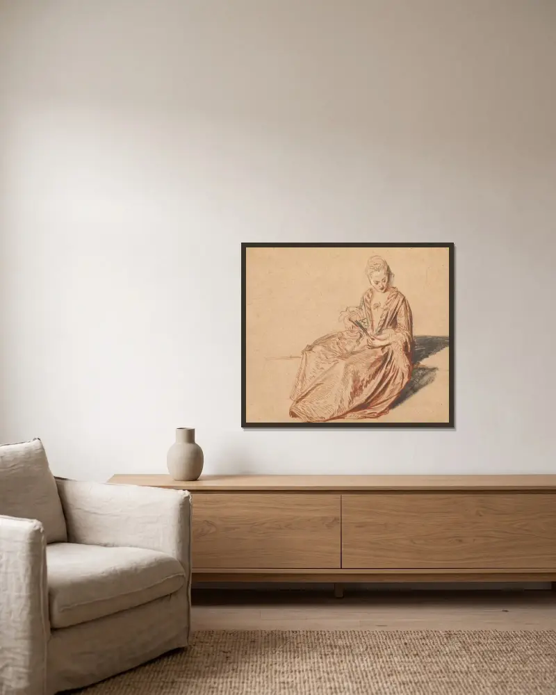 Sittande kvinna med solfjäder av Jean-Antoine Watteau inramad på en vägg