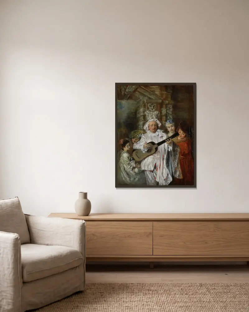 I Mezetins dräkt av Jean-Antoine Watteau inramad på en vägg
