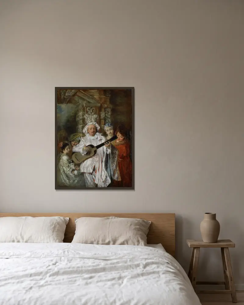 I Mezetins dräkt av Jean-Antoine Watteau inramad på en vägg