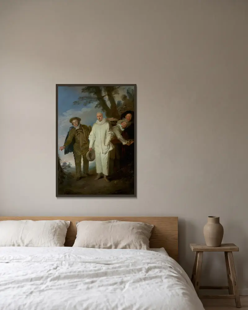 The Italian Comedians av Jean-Antoine Watteau inramad på en vägg