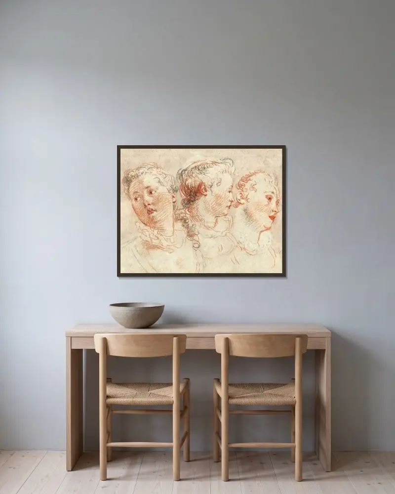Tre studier av en kvinnas huvud av Jean-Antoine Watteau inramad på en vägg