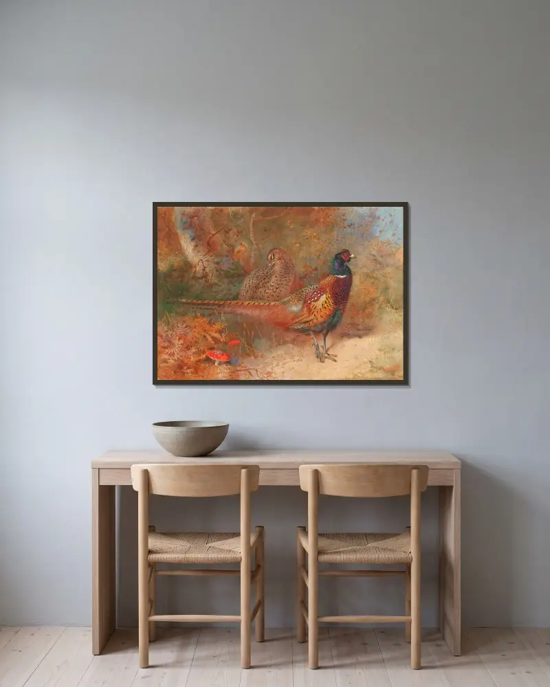 Tupp och höna av fasan av Archibald Thorburn inramad på en vägg