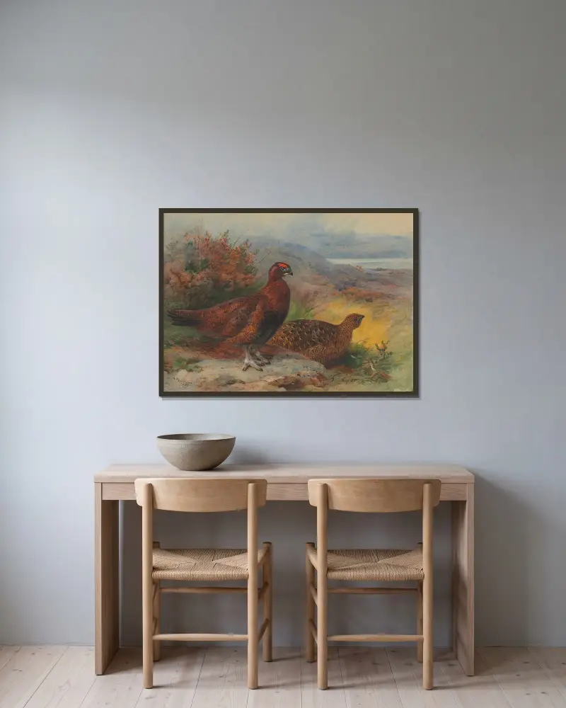 Ett par röda ripor i ett landskap av Archibald Thorburn inramad på en vägg