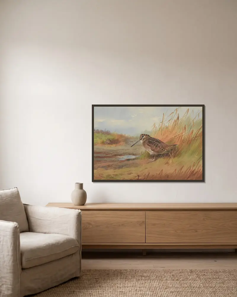 En morkulla av Archibald Thorburn inramad på en vägg