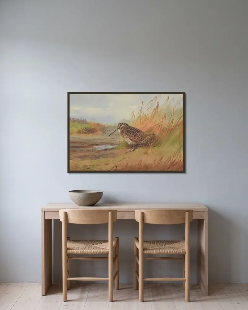 En morkulla av Archibald Thorburn inramad på en vägg