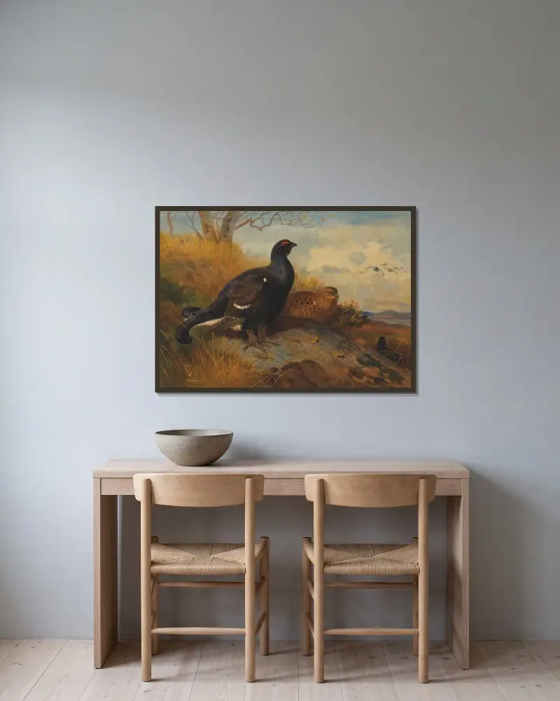 Orrar på klipphäll, med sjö i bakgrunden av Archibald Thorburn inramad på en vägg