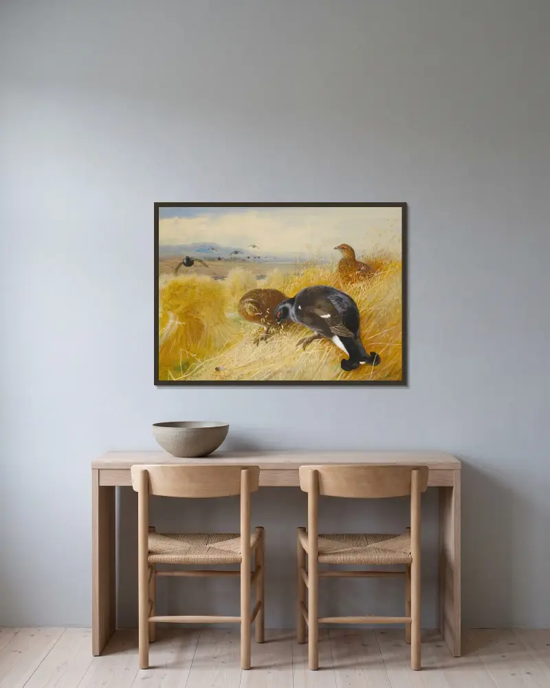 On The Stooks,Blackgame av Archibald Thorburn inramad på en vägg