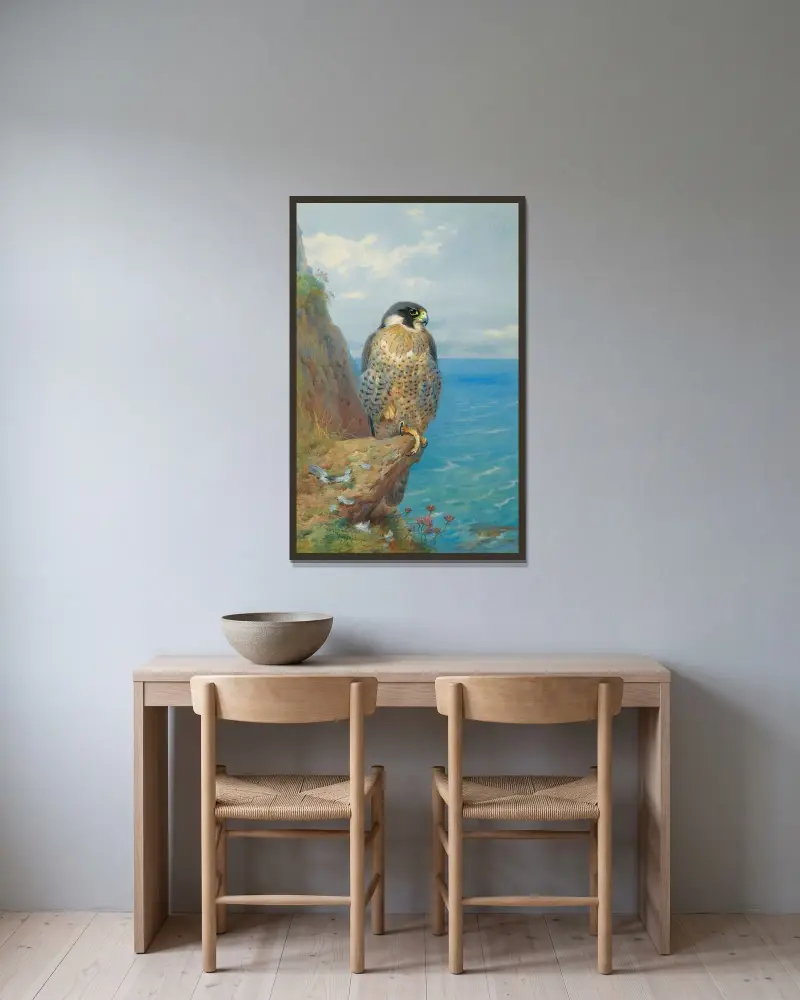 Peregrine At Auchencairn av Archibald Thorburn inramad på en vägg