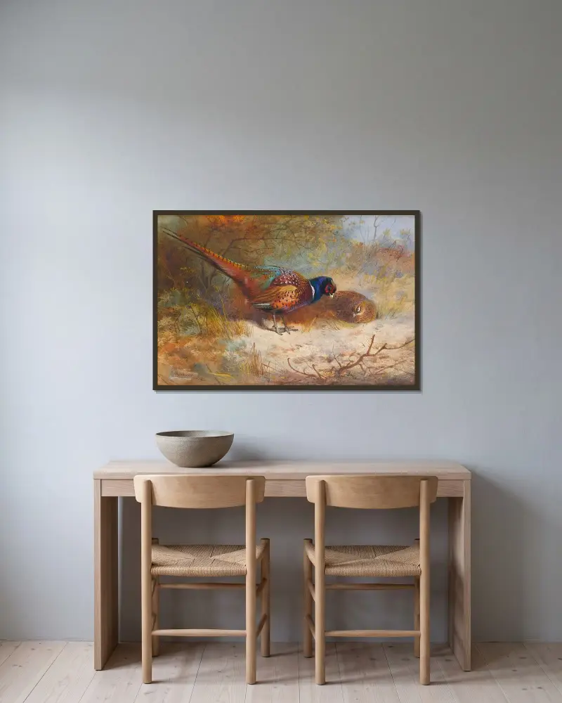 Pheasants av Archibald Thorburn inramad på en vägg