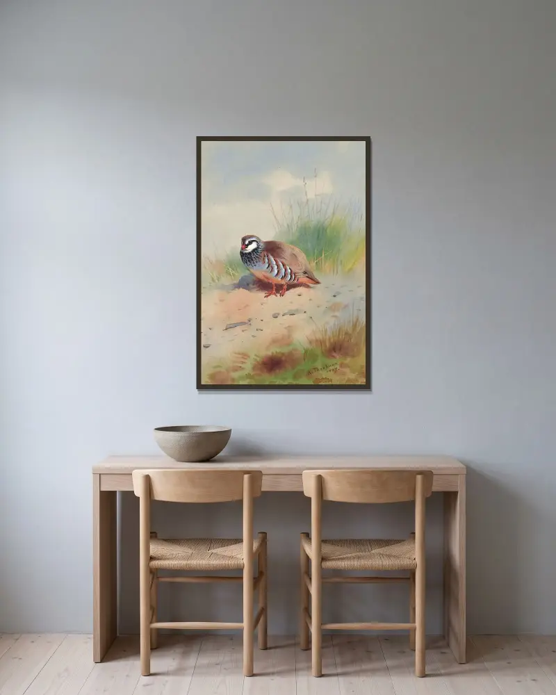 Rödhöna av Archibald Thorburn inramad på en vägg