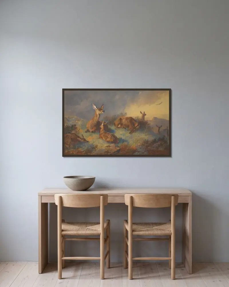 De vaksamma hindarna av Archibald Thorburn inramad på en vägg