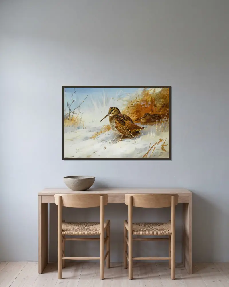 Vintermorkulla av Archibald Thorburn inramad på en vägg