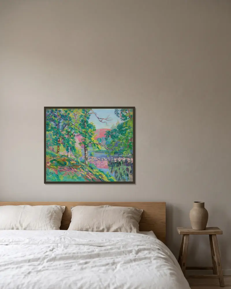 Creuses flodbanker av Armand Guillaumin inramad på en vägg