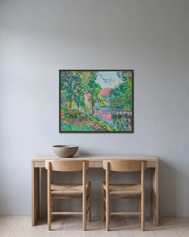 Creuses flodbanker av Armand Guillaumin inramad på en vägg