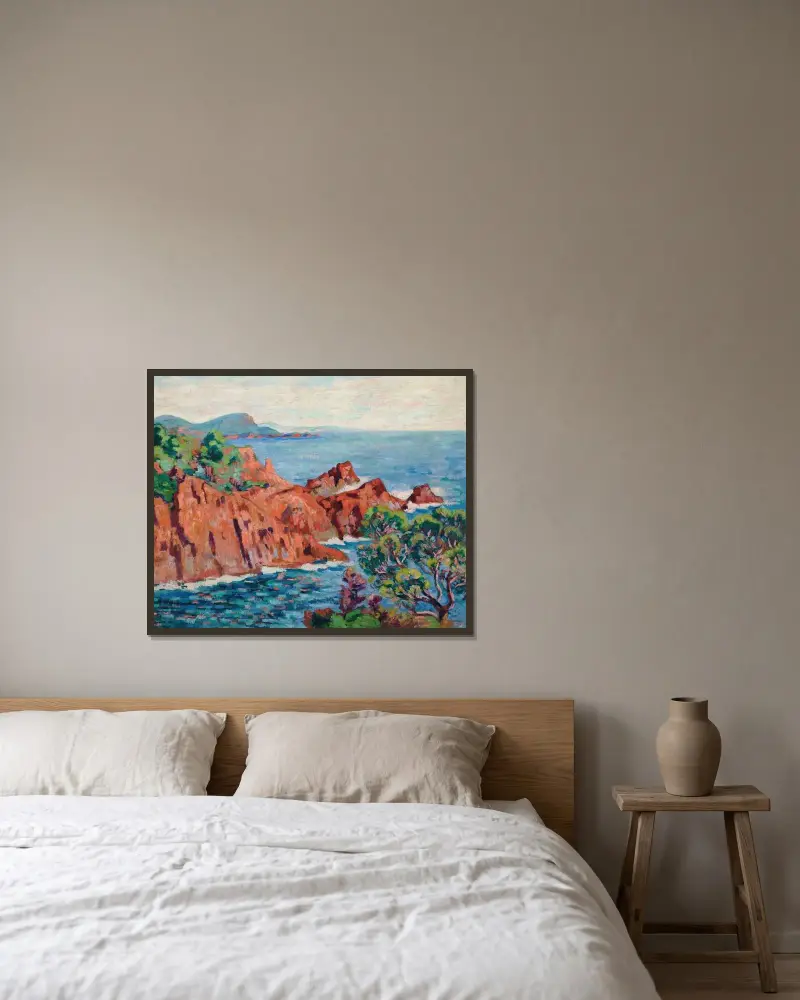 De röda klipporna vid Agay av Armand Guillaumin inramad på en vägg