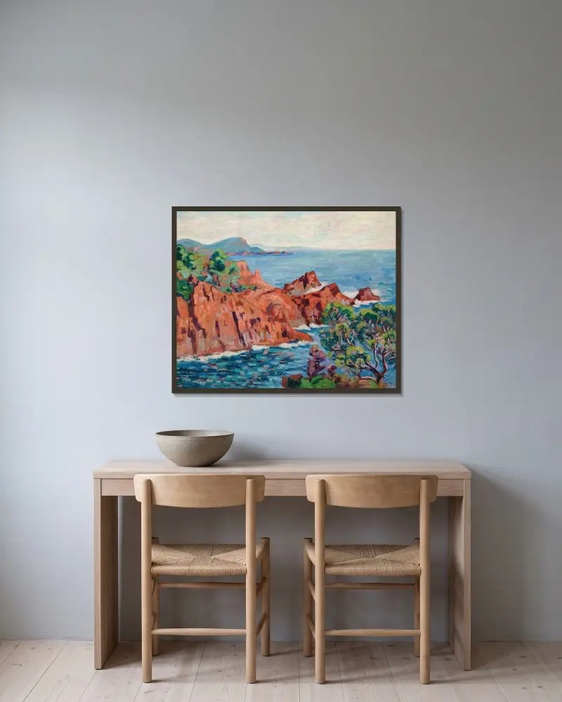 De röda klipporna vid Agay av Armand Guillaumin inramad på en vägg