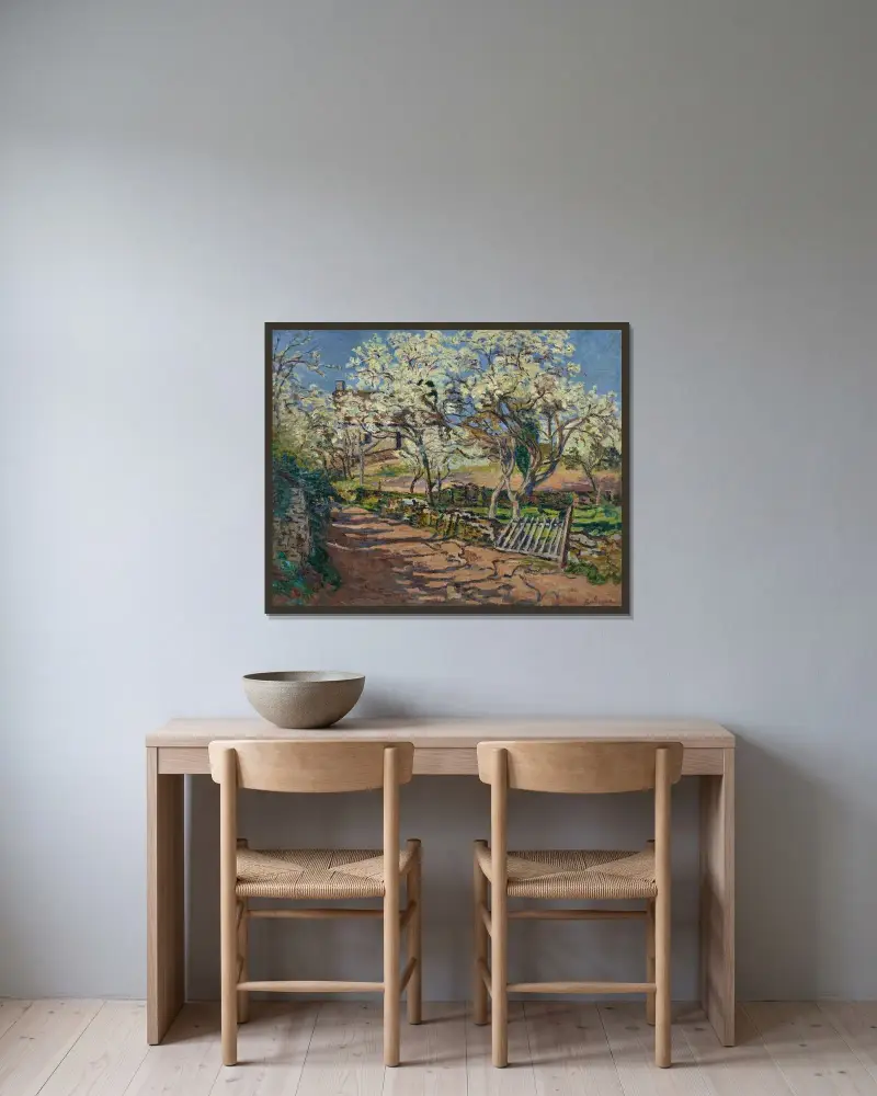 Vårlandskap av Armand Guillaumin inramad på en vägg