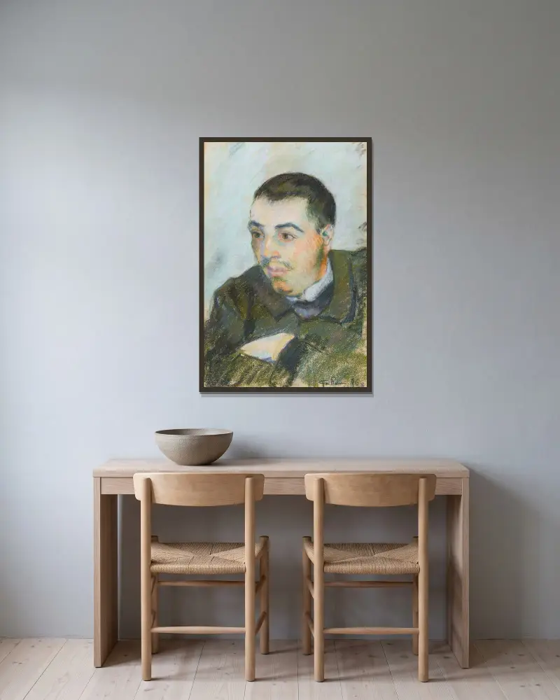 Porträtt av man av Armand Guillaumin inramad på en vägg