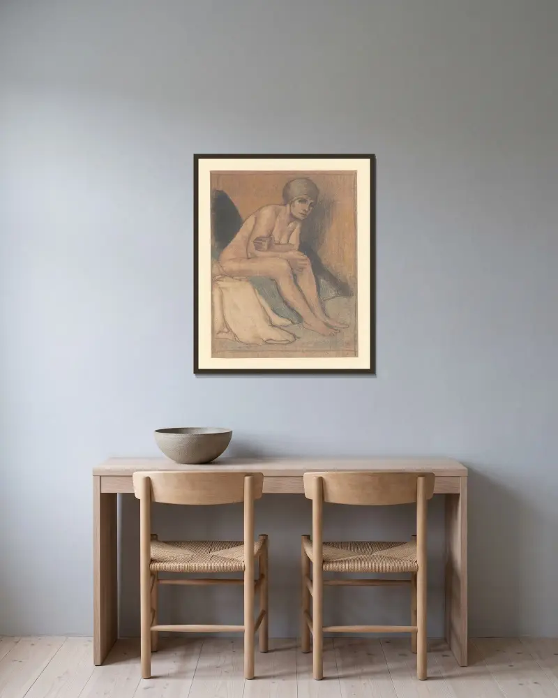 Sitzender weiblicher Akt mit Mütze von Armand Rassenfosse gerahmt an einer Wand