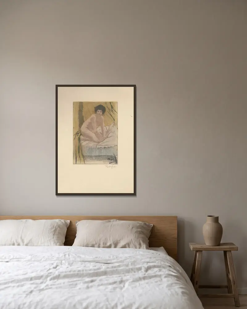 Naken i säng av Armand Rassenfosse inramad på en vägg