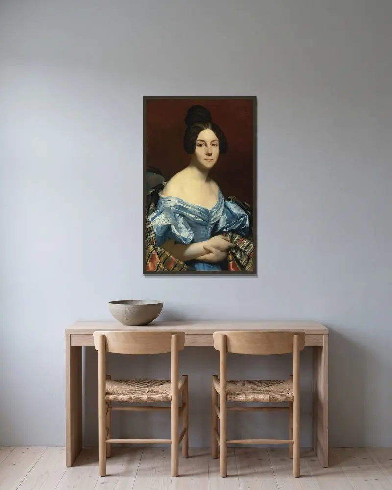 Porträtt av en dam av Ary Scheffer inramad på en vägg