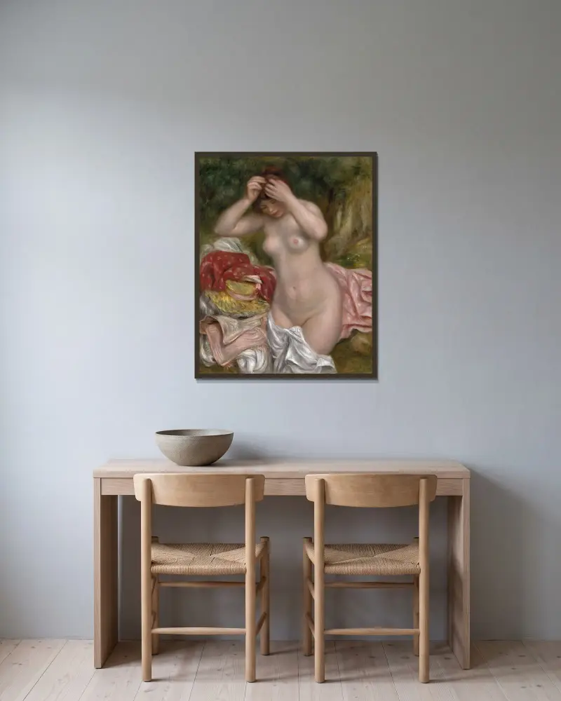 Bather Arranging Her Hair av Pierre-Auguste Renoir inramad på en vägg