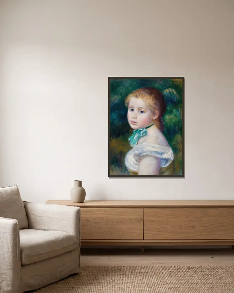 Ung flickas huvud av Pierre-Auguste Renoir inramad på en vägg