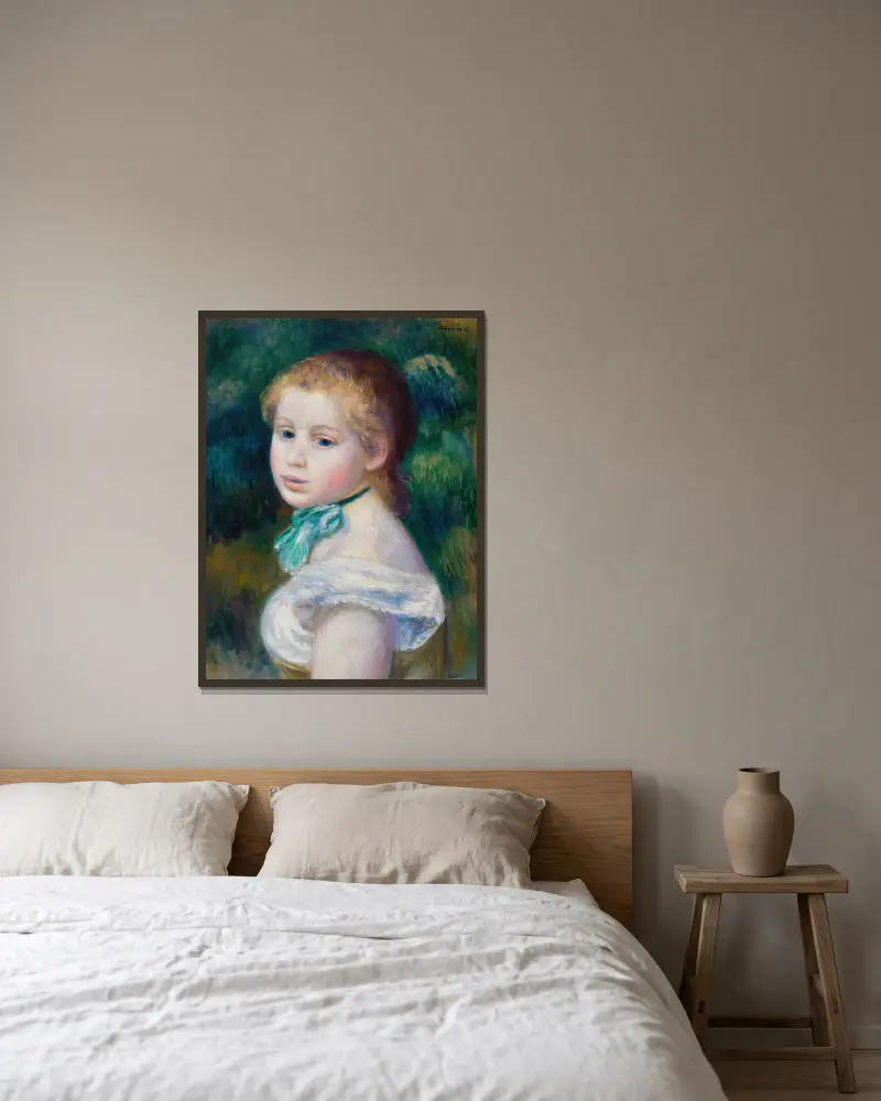 Ung flickas huvud av Pierre-Auguste Renoir inramad på en vägg