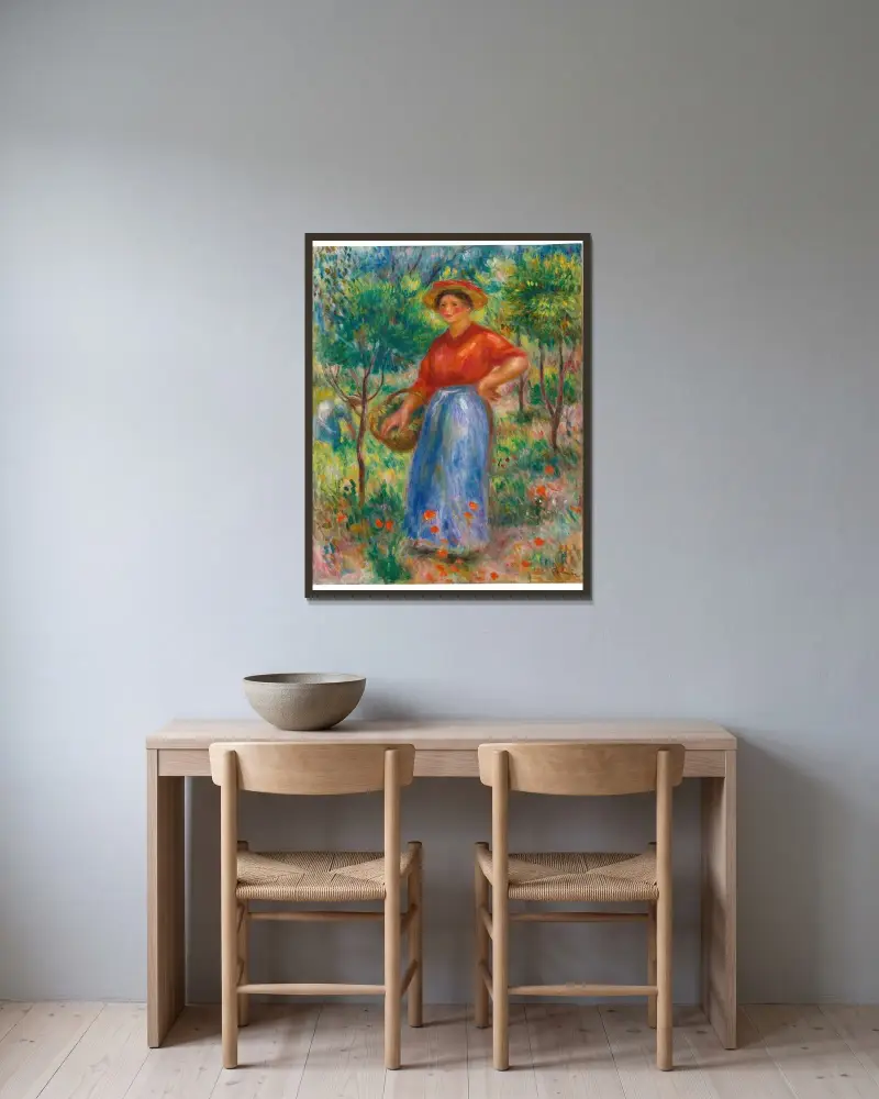 Jeune Fille Au Panier (Gabrielle Au Jardin) av Pierre-Auguste Renoir inramad på en vägg