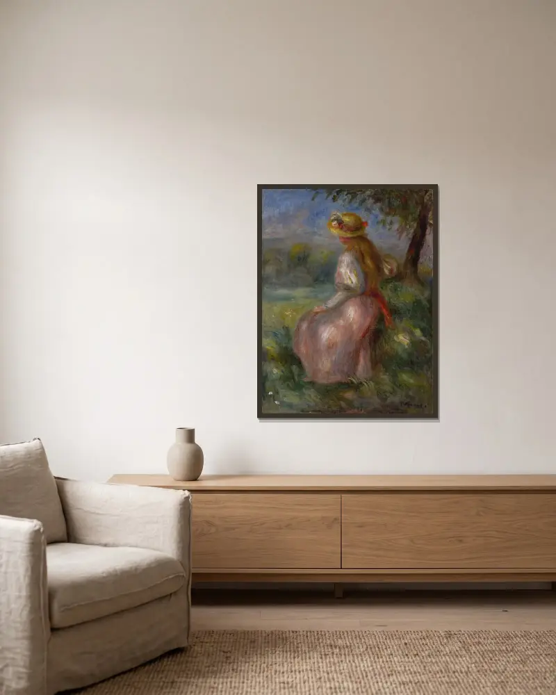 Jeune fille en rose av Pierre-Auguste Renoir inramad på en vägg