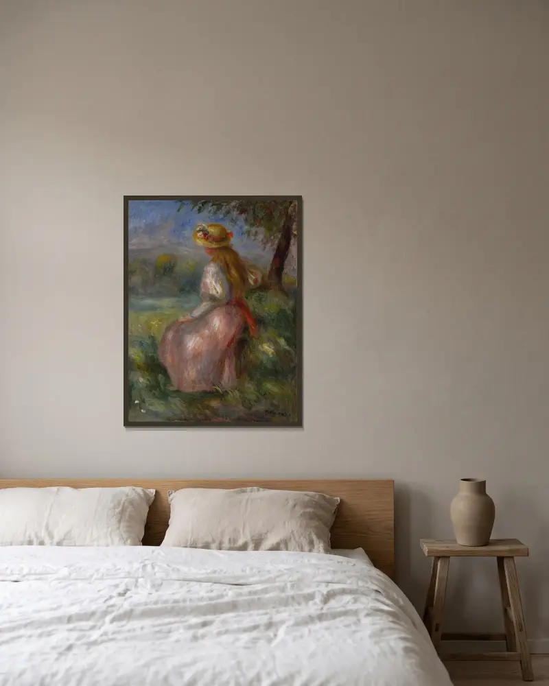 Jeune fille en rose av Pierre-Auguste Renoir inramad på en vägg