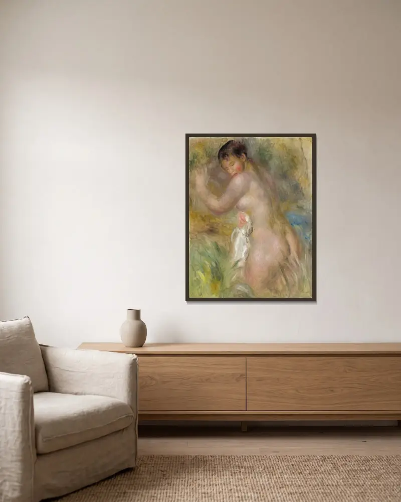 Die Badende von Pierre-Auguste Renoir gerahmt an einer Wand