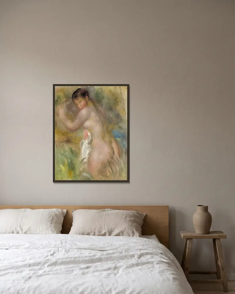 Die Badende von Pierre-Auguste Renoir gerahmt an einer Wand