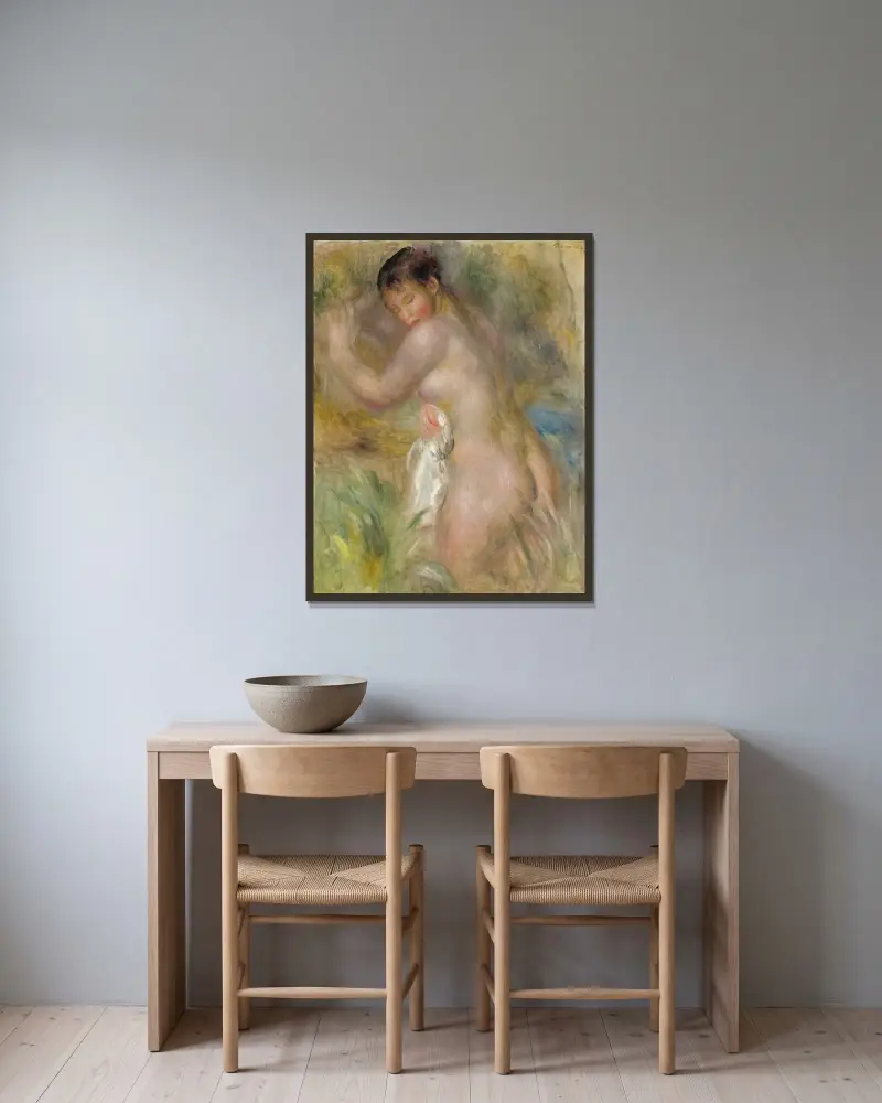 Die Badende von Pierre-Auguste Renoir gerahmt an einer Wand