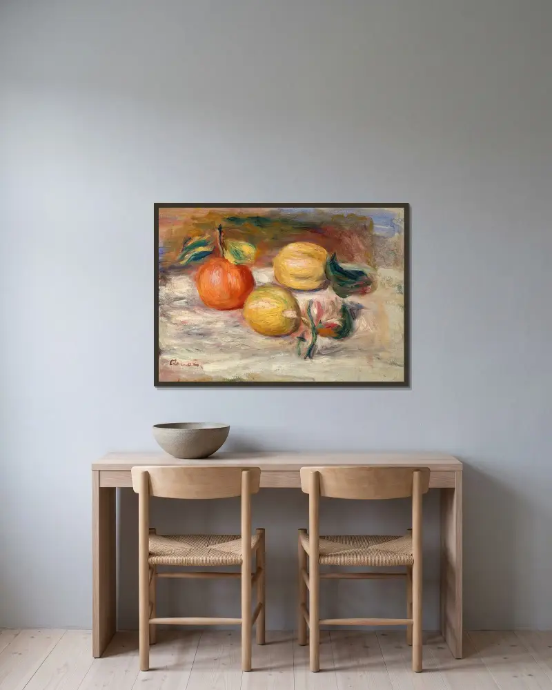 Zitronen und Orange von Pierre-Auguste Renoir gerahmt an einer Wand